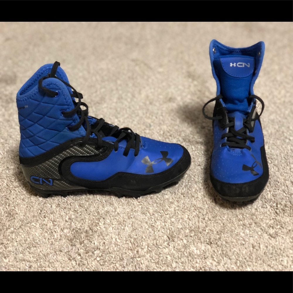 Boys under Armour football cleats
